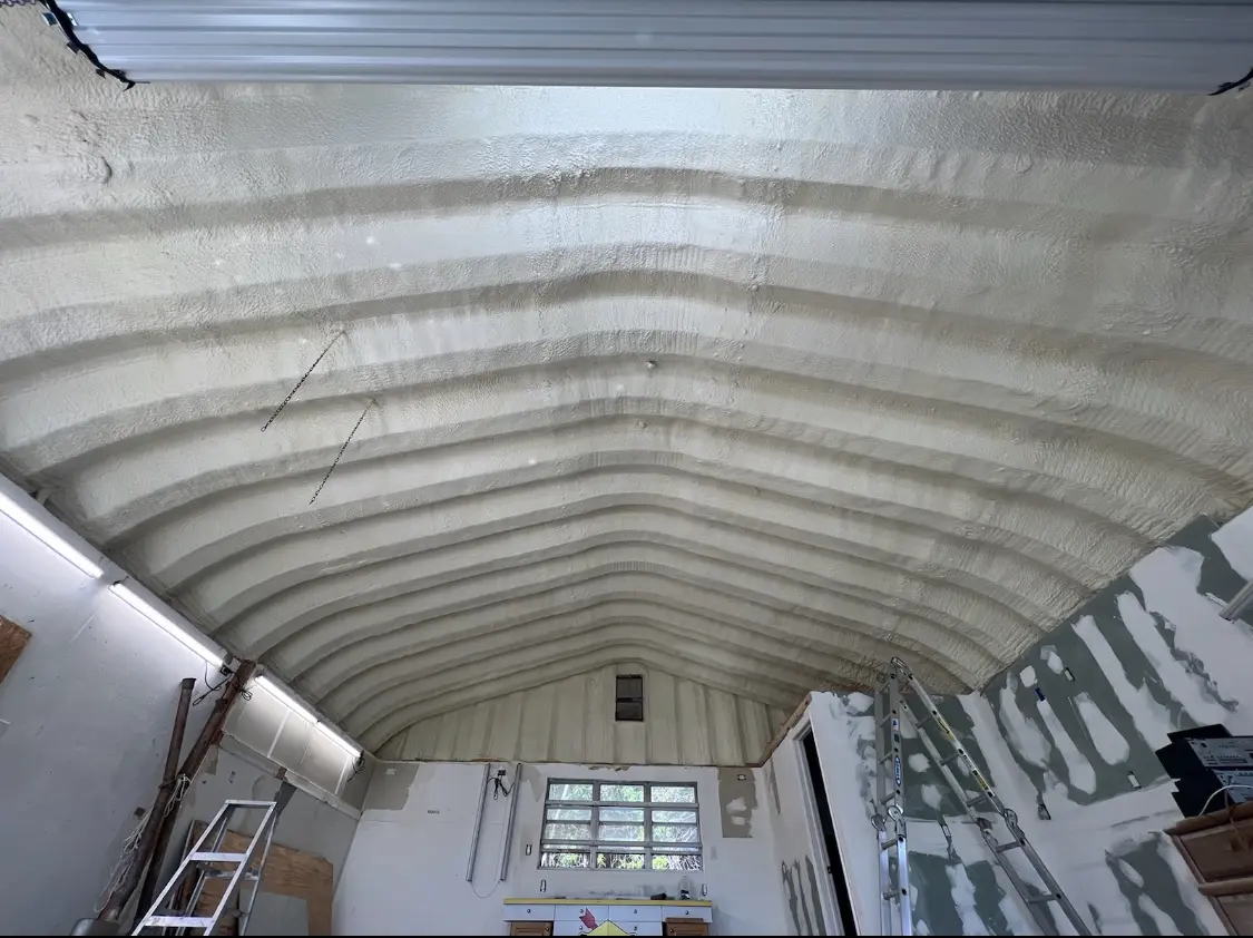 Spray polyurethane foam applied to the underside of a metal roof deck in Council Bluffs