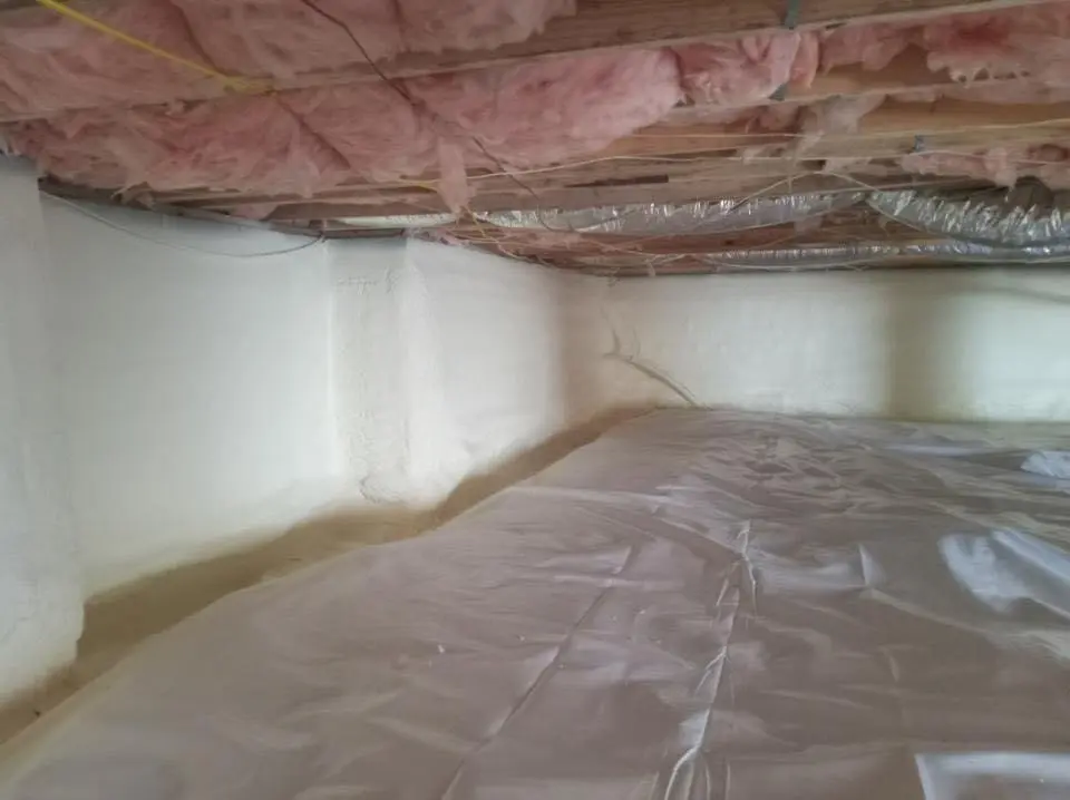 Crawl space encapsulation with closed-cell spray foam for Metal Roof Coating in Council Bluffs
